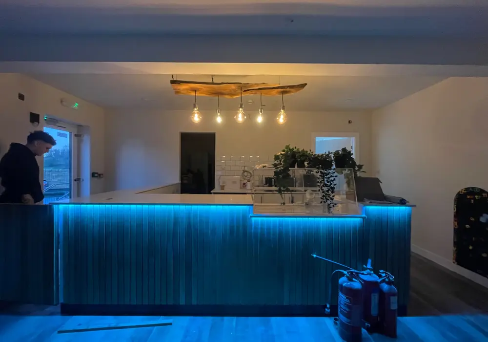 Illuminated café bar and pendant lighting